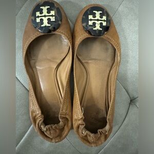 Tan Tory Burch flats. Well loved with life left in them